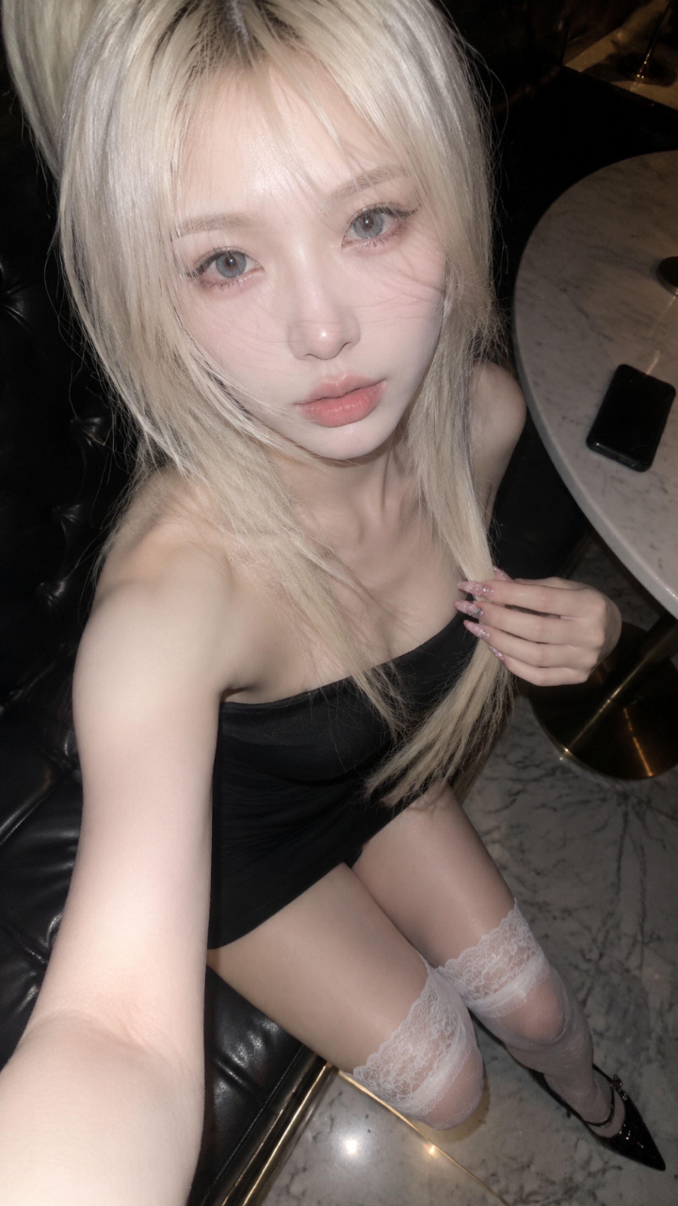 A realistic vertical 9:16 phone selfie, 